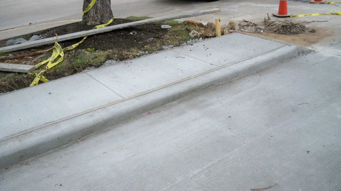 concrete repair to curbs, sidewalk and street